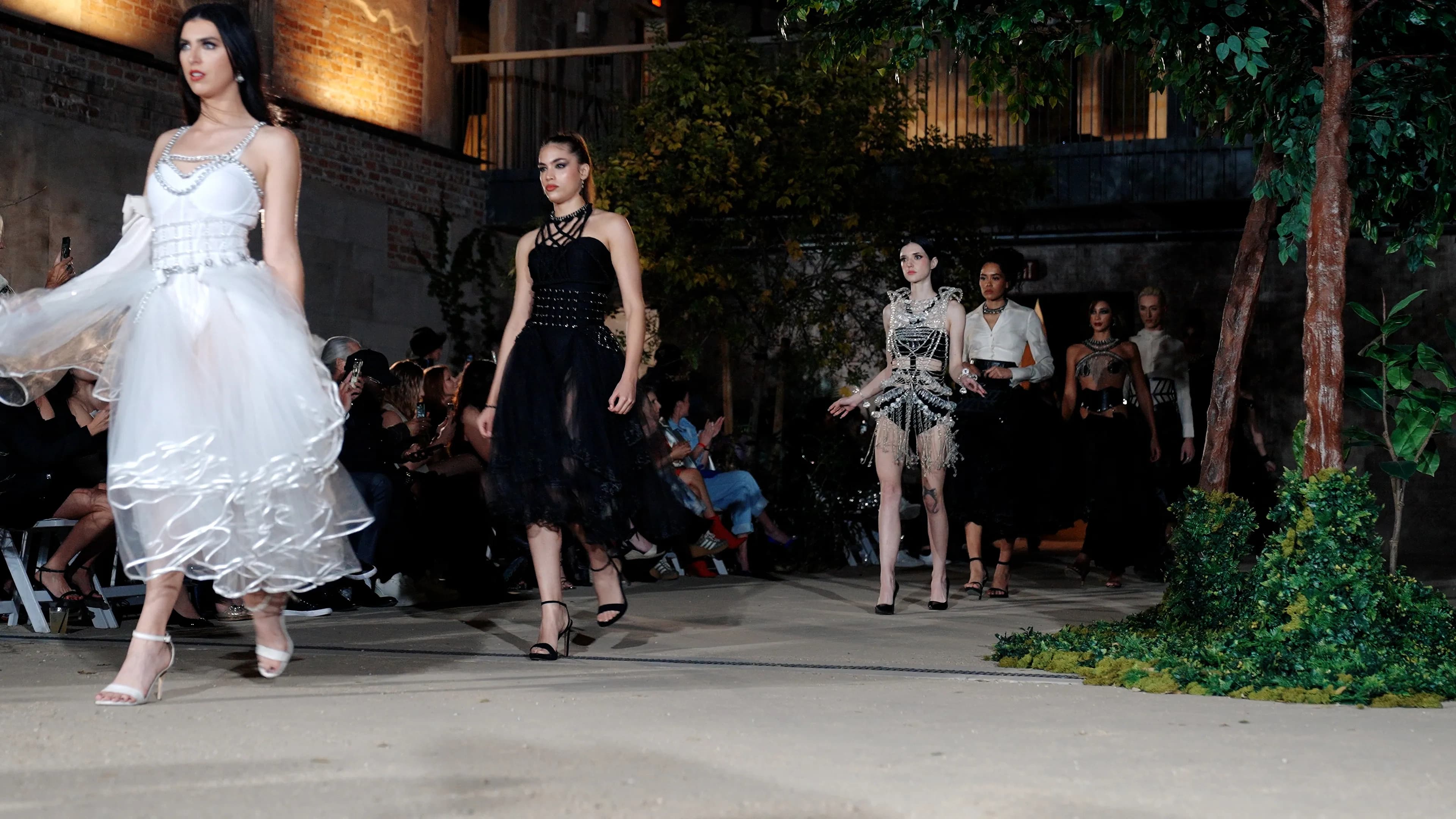 Runway model at a Haute Shots covered fashion show